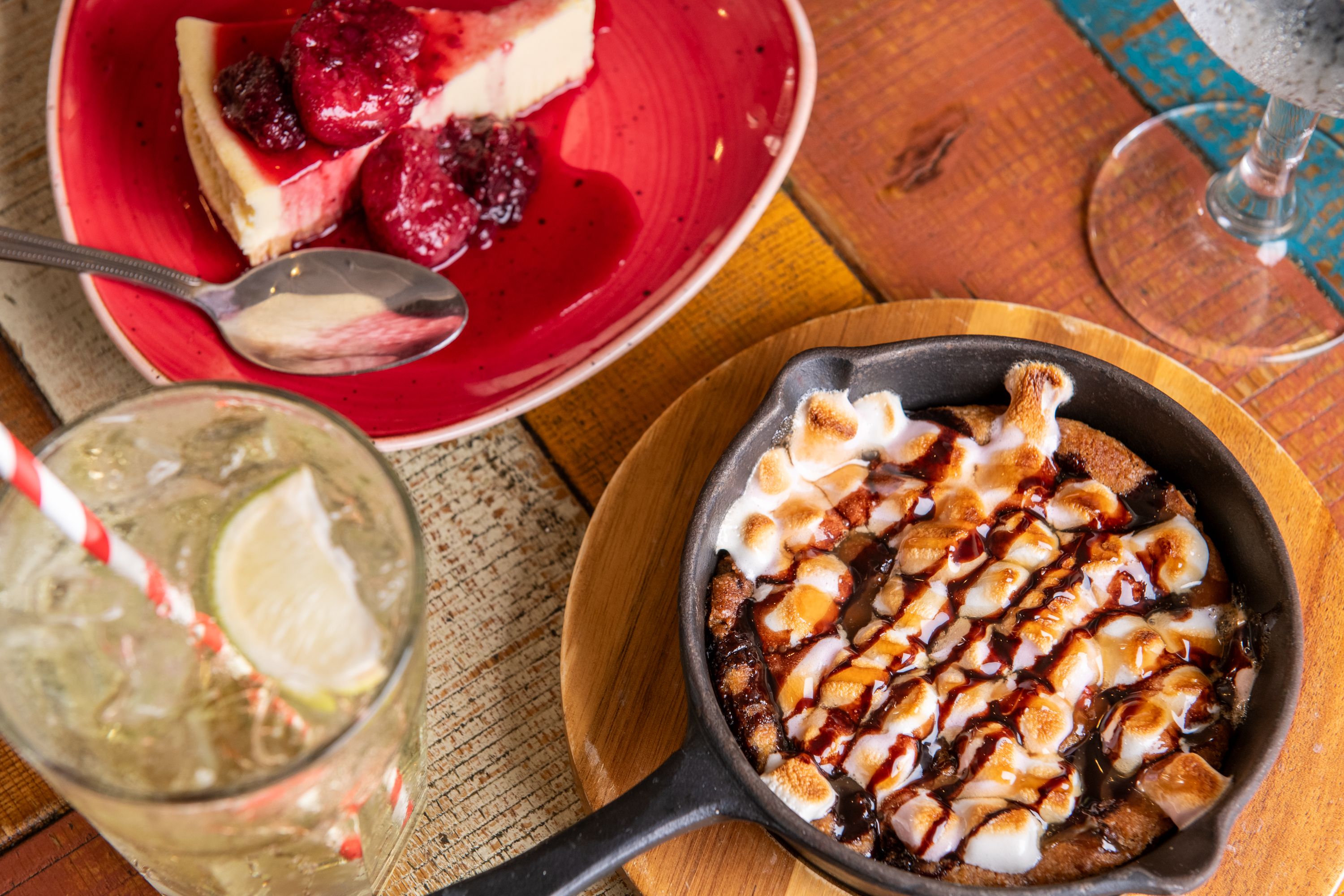 dessert platter and glass of lemonade