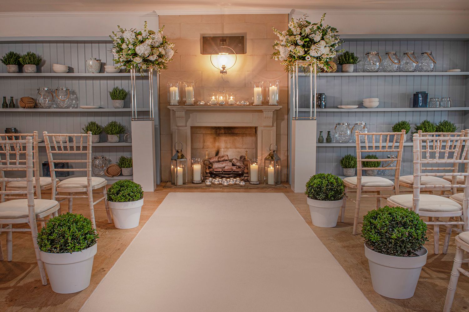 room with fireplace and flowers