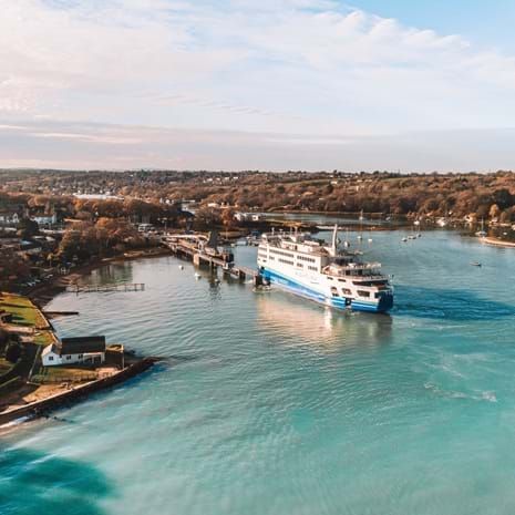 cruise ship arriving at a port